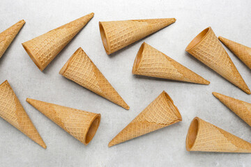 Waffle cones on grey background