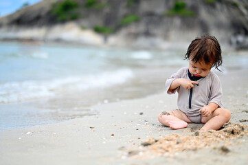 Baby girl on the beach
