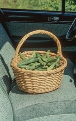 Obraz premium Basket of Fresh Okra on Car Seat Highlighting Farm-to-Table Freshness in Daily Life