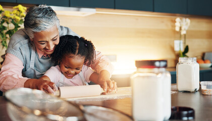 Grandma, little girl and baking with roller on table in kitchen for learning, teaching or making dough at home. Happy grandmother, child or junior baker preparing dessert, cookies or pastry recipe