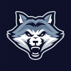 Obraz premium Fierce wolf mascot logo head, perfect for sports or esports branding.