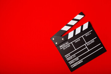 Movie clapper. Movie clapperboard on a bright colored background. Concept of rest and...