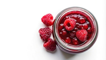 Aerial view of canned raspberry jam in glass jar on white background