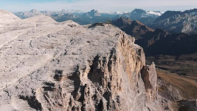 Aerial view of mountain peaks during sunrise in the Dolomites, Italy