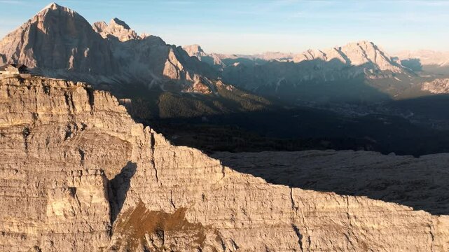 Aerial view of mountain peaks during sunrise in the Dolomites, Italy