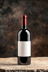 Fototapeta premium Minimalist Wine Bottle with Blank Label on Stone Background