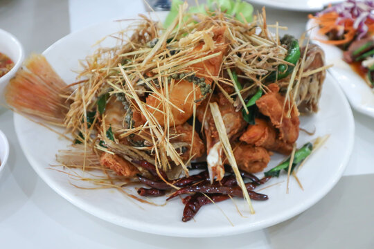 fried fish or fried sliced fish or fried ruby fish with vegetable