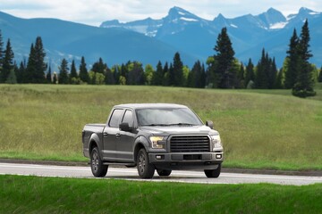 Early morning mist and pickup truck © AlexGo