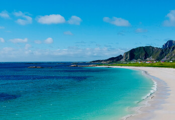 Fototapeta premium Turquoise waters and white sandy beach at Stave, along Norwegian Scenic Route Andøya in Northern Norway