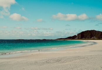 Obraz premium Turquoise waters and white sandy beach at Stave, along Norwegian Scenic Route Andøya in Northern Norway