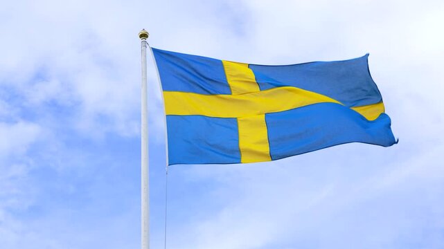 National flag of Sweden waving in wind in slow motion