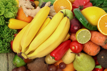 Many different fruits and vegetables as background, top view