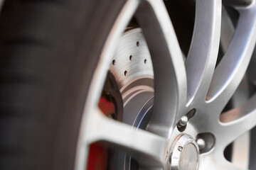 Performance Brake Rotor with Drilled Holes on Modern Car