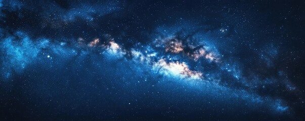 Obraz premium A starry night sky with a clear view of the Milky Way, creating a sense of wonder and vastness