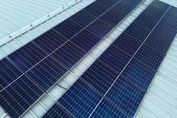 Rooftop solar panels on large metal industrial building