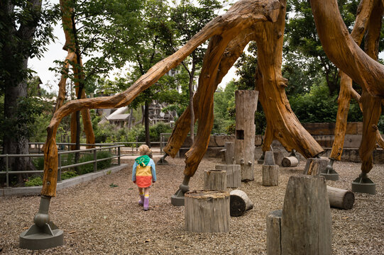 Child Exploring Adventure Playground At Gathering Place In Tulsa
