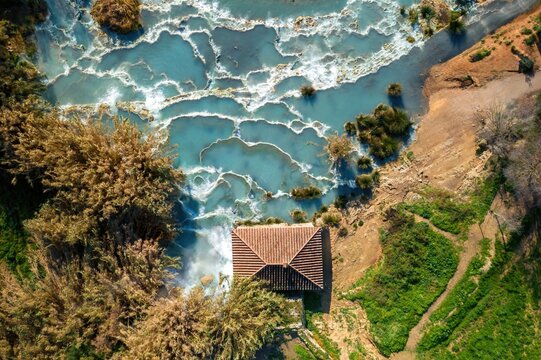 Saturnia hot springs with turquoise water drone aerial top view