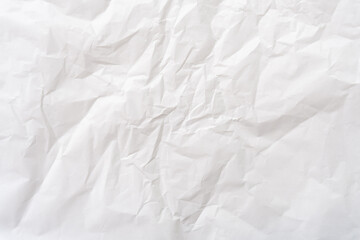 Top view and full frame of wrinkled or crumpled white paper texture used as crumpled white paper background texture in decorative art work