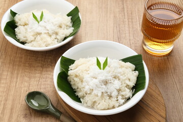 Ketan Kelapa Parut, Indonesian traditional snack, made from steamed glutinous rice and served with grated coconut
