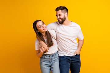 Obraz premium Photo portrait of pretty young male female hugging support trust wear trendy white outfit isolated on yellow color background