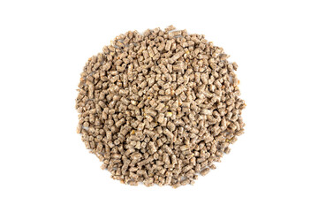 a pile of compound feed for feeding animals and poultry isolated on a white background top view