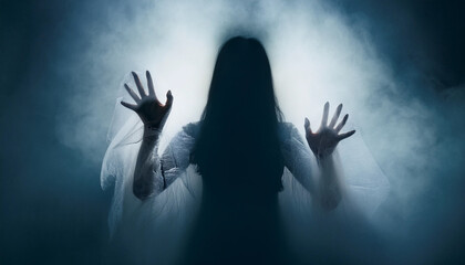 scary blurry dark silhouette ghost woman with stretched out hands in the dark fog. scene for halloween or darkness.