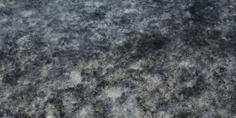 Fototapeta premium Textured abstract background of gray and black rough stone surface