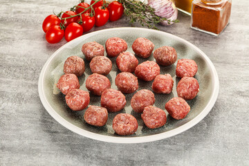 Uncooked raw beef meatball minced