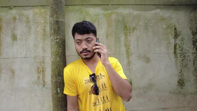 Rohingya man person is talking on the phone