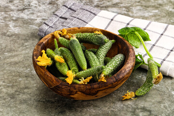 Raw gherkin cucumbers in the bowl