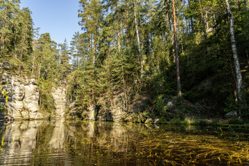 Obraz premium National Park of Adrspach Teplice rocks. Beautiful limestone sandstones rocks in Adrspach, Czech Republic. Adrspach Teplice Rocks mountain range in Central Sudetes part of the Table Mountains.