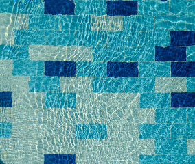 White reflections in motion on the water the pool. 2