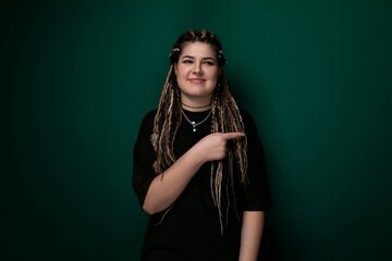 Woman With Dreadlocks Pointing at Something