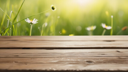 Fototapeta premium Empty wooden table with spring green meadow theme in background