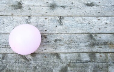balloon on wooden floor