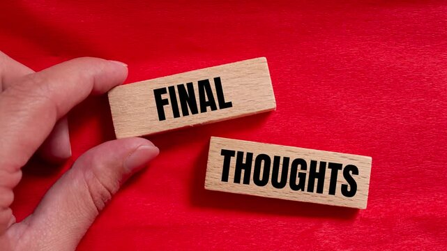 Final thoughts message writing on wooden blocks on red background. Conceptual final thoughts symbol.