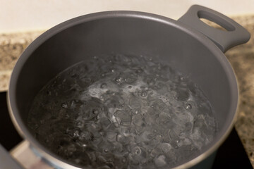 Boiling water on the stove