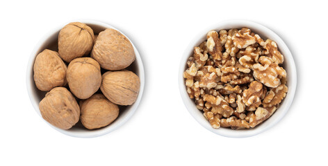 Bowls with organic walnut nuts isolated on white background.Top view.
