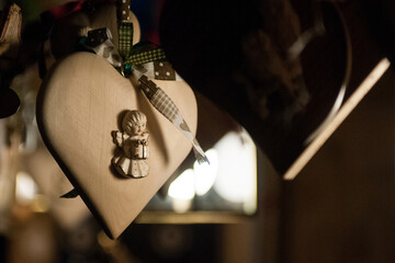 A Christmas decorative wooden heart at the traditional Christmas markets of Bolzano, in Italy.....