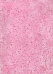 Textured pink watercolor background with watercolor splashes and on watercolor paper