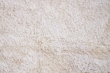 he texture of a soft white carpet with a long pile