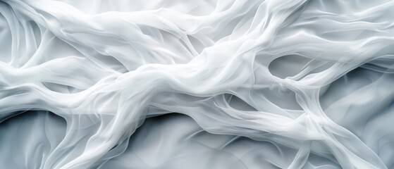 Obraz premium A tight shot of a white cloth, textured with white and light blue hues, suggesting wind presence - be it still or in motion