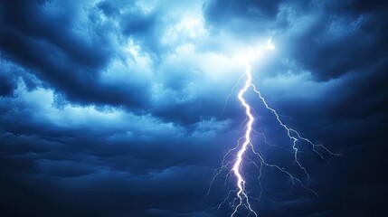 Cloud-to-ground lightning strike in the midst of a storm, with the bolt sharply outlined against a dark, turbulent sky.