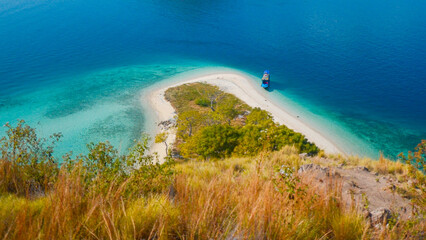 Stunning island paradise with green cliffs, turquoise waters, and golden beaches. A dream summer escape.