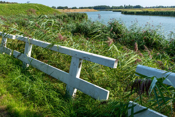 white railing on a canal