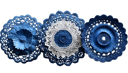  three blue doilies arranged in a triangular formation. The doilies are made of lace and have a delicate, intricate design