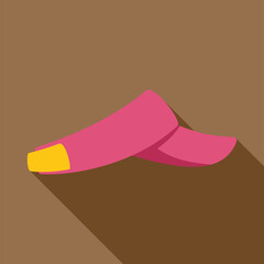 Pink sun visor casting long shadow on brown background, symbolizing sun protection during outdoor activities