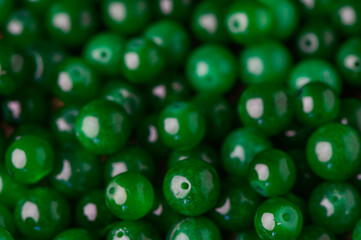 green real stone beads for making beads as background 2