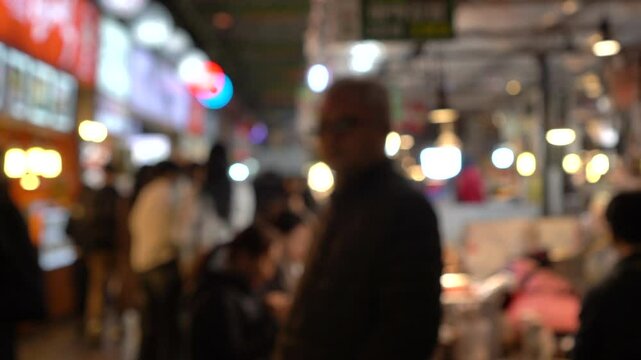 Gwangjang market local traditional food stall Seoul city food retails blur shot