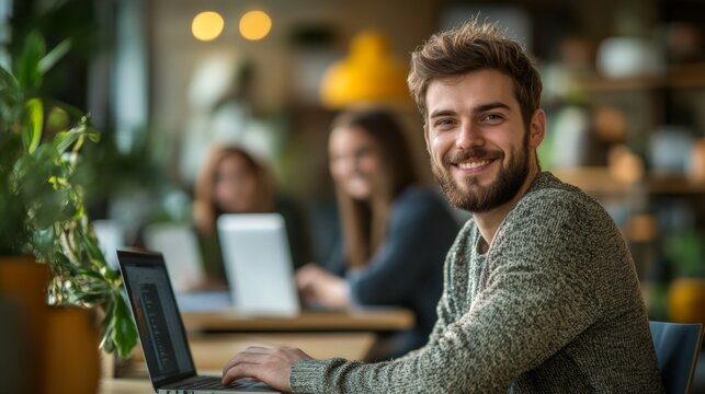 Young Professional Working in Office with Colleagues